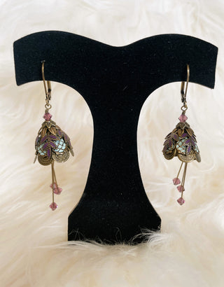 We think these earrings are exquisite, inside and out